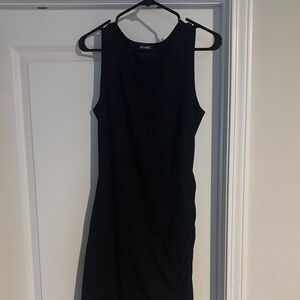 Stylein Black Sleeveless Midi Dress with Sculpted Silhouette